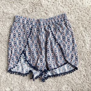 H&M navy and orange floral patterned shorts
